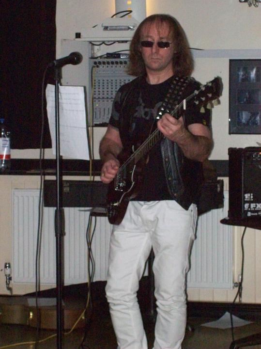 Terry Hughes Vocals Lead guitar